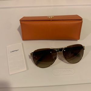 Tory Burch sunglasses. New but without tags. In original case